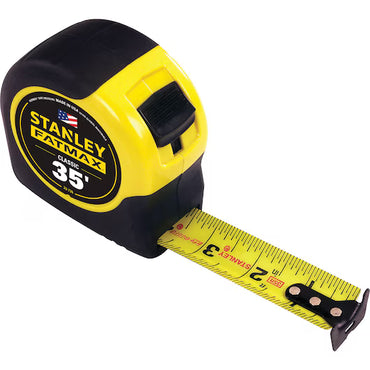 A yellow and black STANLEY® FATMAX® 35 ft Tape is partially extended to display its inch markings.