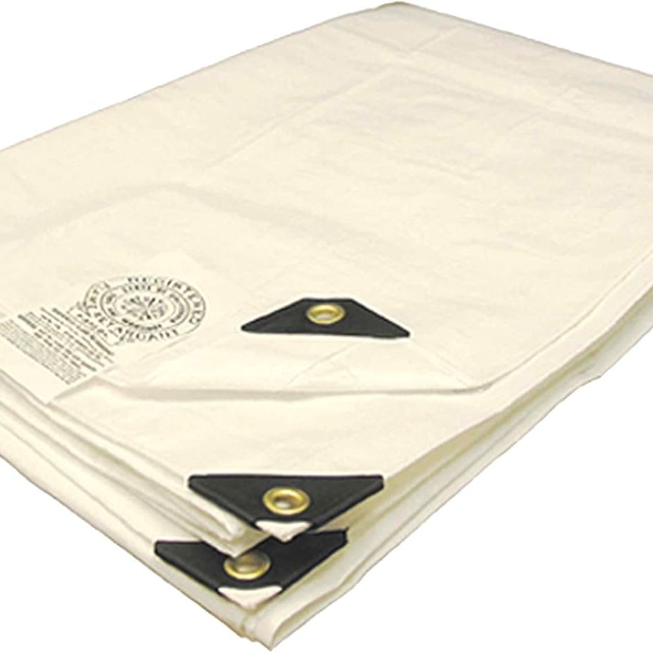 The Tarplex 30 ft. x 40 ft. white 7 mil poly construction tarp by Go Build features reinforced black corners, brass grommets, and a label showcasing text and a logo on its folded surface.