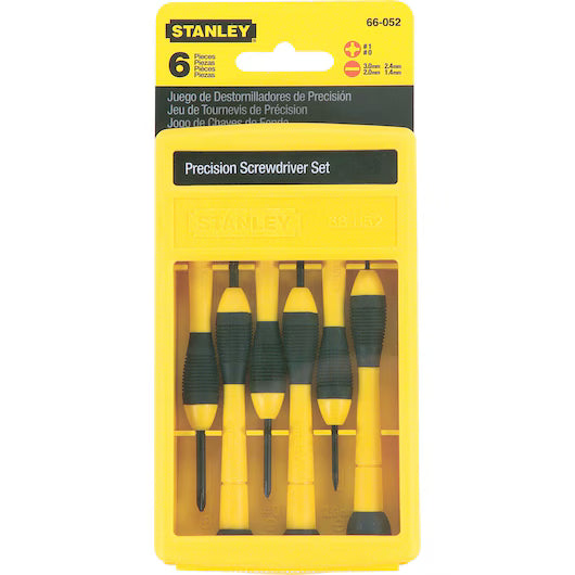 A yellow plastic package holds the STANLEY® Precision Screwdriver Set of 6 PC, featuring hardened steel tips and black-and-yellow handles, all arranged neatly in the packaging.