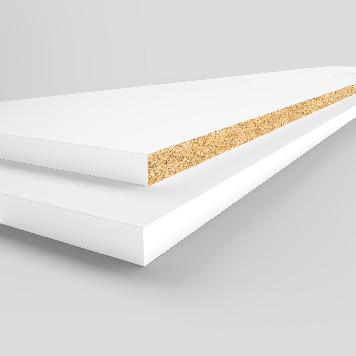 Two stacked 1 In. x 16 In. x 8 Ft. white Melamine Shelves by Go Build, known for durability, expose their wood particle core on one edge against a plain gray background.