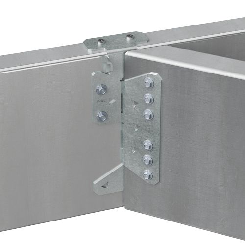 Close-up of a Simpson Strong-Tie S/HJCT-KT galvanized metal corner bracket connecting two aluminum panels. The skewable joist hanger is secured with multiple screws, demonstrating a sturdy joint. The panels have a sleek, brushed metal finish.