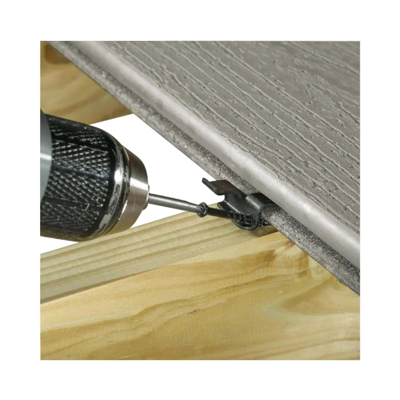 A close-up of a Go Build 200 sq. ft. Universal Hidden Deck Fastening System securing a composite deck board to a wooden joist with its universal clip design—by Go Build, The Fastest Way To Build.