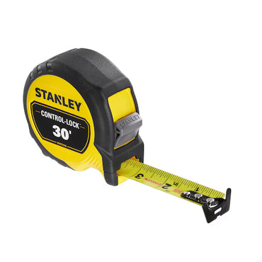 A STANLEY 30 ft. CONTROL-LOCK™ Tape Measure in yellow and black, partially extended to show inch measurements.