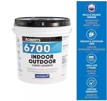 A 4-gal. bucket of ROBERTS Creamy Tan Indoor/Outdoor Carpet and Artificial Grass Adhesive is shown with a blue info panel highlighting antimicrobial protection, carpet installation, 2-year shelf life, and lifetime warranty.