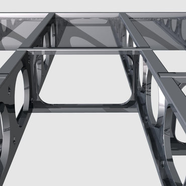 Close-up of Go Build Joist Blocking 10 16OC 16GA—metallic, rectangular frame with circular cutouts, showing strength and stability like a floor joist; glossy, reflective finish emphasizes quality on a light background.