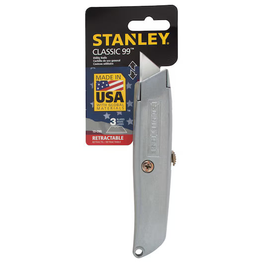 The STANLEY® 99E Classic Retractable Blade Utility Knife in silver is shown in black packaging with yellow and white text, labeled Made in USA and Retractable Blade.