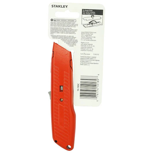 A STANLEY® Self-Retracting Safety Utility Knife in red, packaged with safety instructions and a barcode on a white cardboard backing.