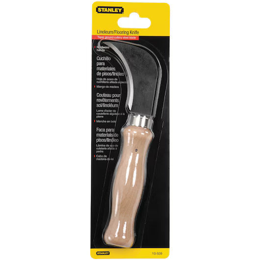 The STANLEY Linoleum Knife features a curved blade and light wood handle, packaged in plastic on yellow and black cardboard—perfect for precision flooring cuts.