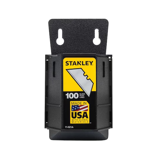 The STANLEY 11-921A Heavy-Duty Utility Blades with Dispenser (100/PK) features a black plastic case with yellow STANLEY logo, razor blade image, and "Made in USA with global materials" emblem. Ideal for utility knife blade replacements.