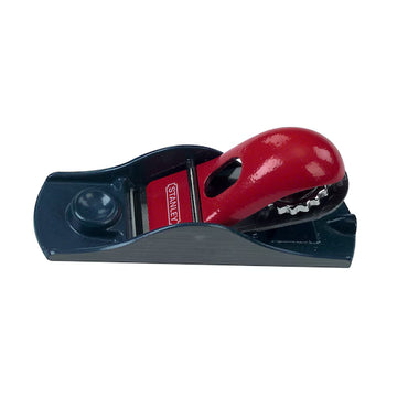 The STANLEY 6-5/8 IN ADJUSTABLE BLOCK PLANE features a blue base and red adjustable lever, making it ideal for smoothing, shaping, and precision trimming of wood surfaces.