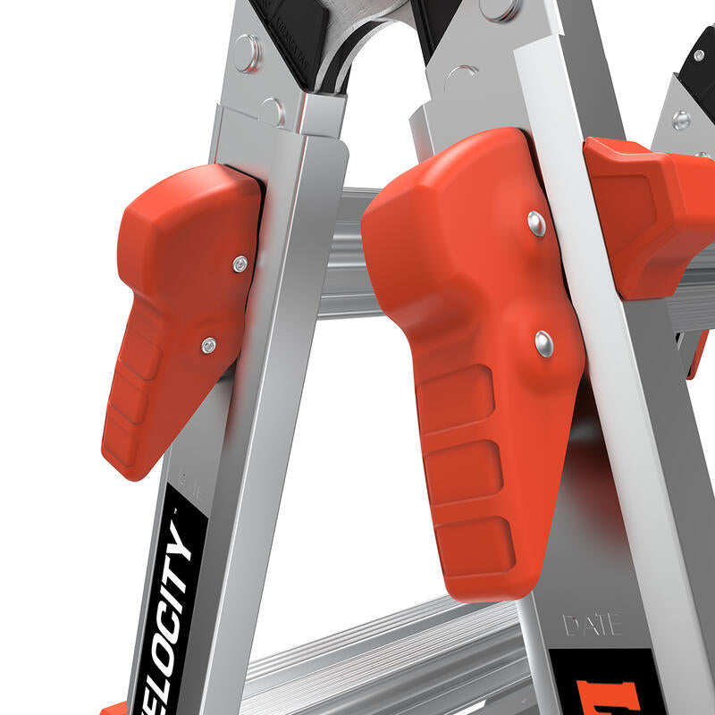 Close-up of the LITTLE GIANT 15413-001 Velocity IA 3 ft. - 11 ft. aluminum articulated extension ladder, highlighting its red safety locking mechanisms and hinge, with "VELOCITY" partly visible on the side.