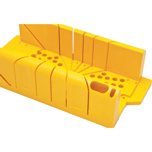 The STANLEY® Clamping Mitre Box with Saw by STANLEY is a bright yellow plastic tool with angled slots and circular holes for precise wood cutting, making it ideal for woodworking projects.