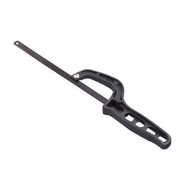 The STANLEY® Mini Hacksaw by STANLEY features a thin straight blade and a plastic handle with cut-out holes for grip, making it ideal for cutting metal. Isolated on a white background.