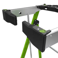 Close-up of the LITTLE GIANT 19304 FORTRESS IAA 4 fiberglass platform ladder with wraparound, featuring sturdy legs, black and green end caps, and adjustment mechanisms for exceptional stability.