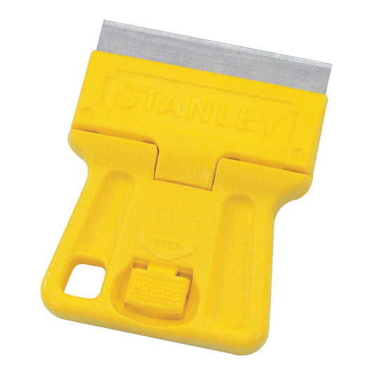 The STANLEY 1-3/16 in High Visibility Mini-Razor Blade Scraper has a yellow handle, metal blade, safety cover, thumb press button labeled PRESS, and a hole for hanging or attaching.