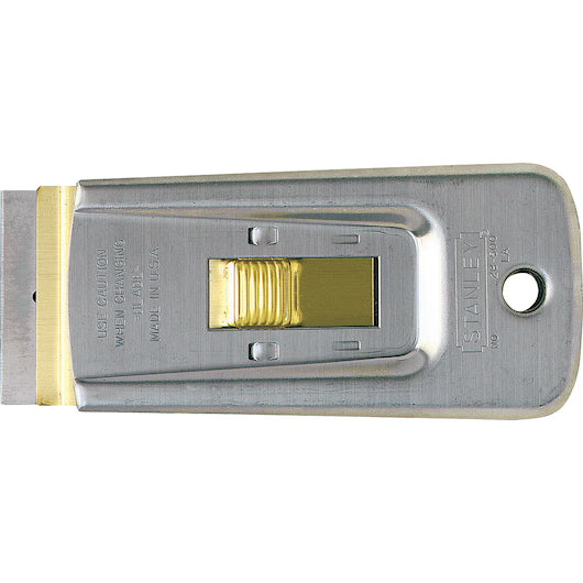 The STANLEY® Professional Glass Scraper by STANLEY features a gold sliding button for blade adjustment, a rectangular shape with rounded end, hanging hole, and replaceable blade—ideal for tough glass scraping tasks.