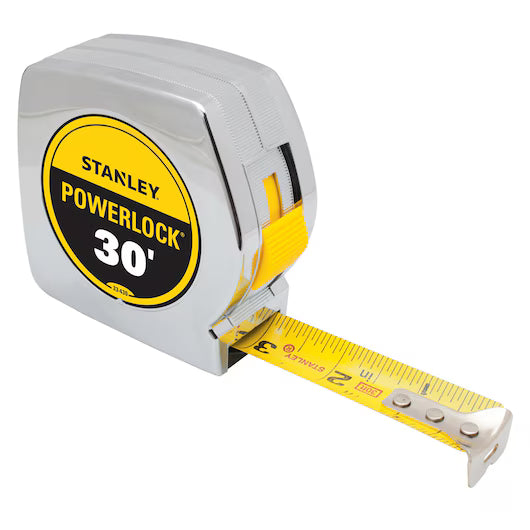 The STANLEY 30 ft PowerLock® Tape Measure with BladeArmor® features a yellow blade with black markings, extended to about 3 inches, and is housed in a durable chrome case.
