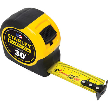 The 30 ft STANLEY® FATMAX® Classic Tape Measure features yellow and black design with BladeArmor® coating, displaying both inch and centimeter markings.
