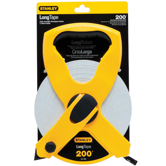 The STANLEY 1/2 in x 200 ft Open Reel Fiberglass Long Tape features a yellow and black plastic case with visible coiled white tape through the open center, displayed in its packaging for easy viewing and access.