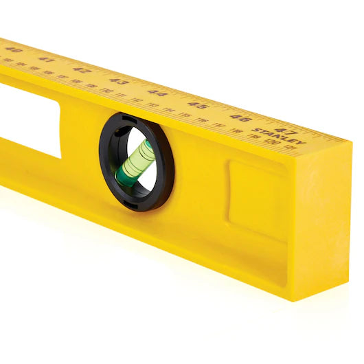 The STANLEY® ABS I-Beam Level 1200mm by Go Build, The Fastest Way To Build, is a yellow spirit level featuring a built-in bubble vial for horizontal alignment, a top-edge ruler, and durable ABS construction.