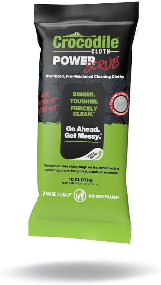 A green PACOA Crocodile Cloth PowerSCRUB Heavy‑Duty Cleaning Wipes 10‑Pack (15″ × 10″) features bold text and product details on oversized, pre-moistened dual-surface wipes, highlighting strength and cleaning effectiveness.