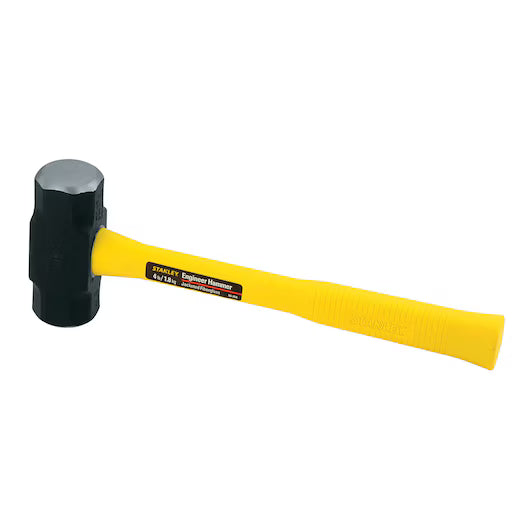 The STANLEY F/G HDLE HAMMER EMGRG 4LBS/1.8KG features a yellow textured fiberglass handle, a black metal head, and a label near the head—perfect for emergency work.
