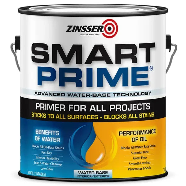 A 1-gal can of ZINSSER Smart Primer White by Zinsser, with bold text and graphics showcasing its water-based formula, stain blocking, zero VOC, and all-surface use. The mostly white label features blue, yellow, and black accents.
