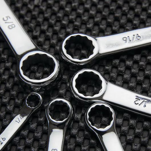 The STANLEY COMBINATION WRENCH SET SAE (6 PC) showcases six chrome vanadium steel wrenches with SAE sizes, such as 5/8 and 9/16, neatly arranged on a textured black surface.