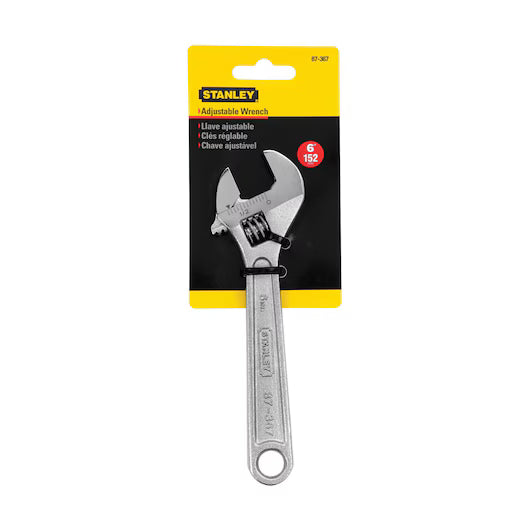 The STANLEY WRENCH ADJUSTABLE 6 is a silver alloy steel tool attached to black and yellow packaging featuring product information in English and Spanish.