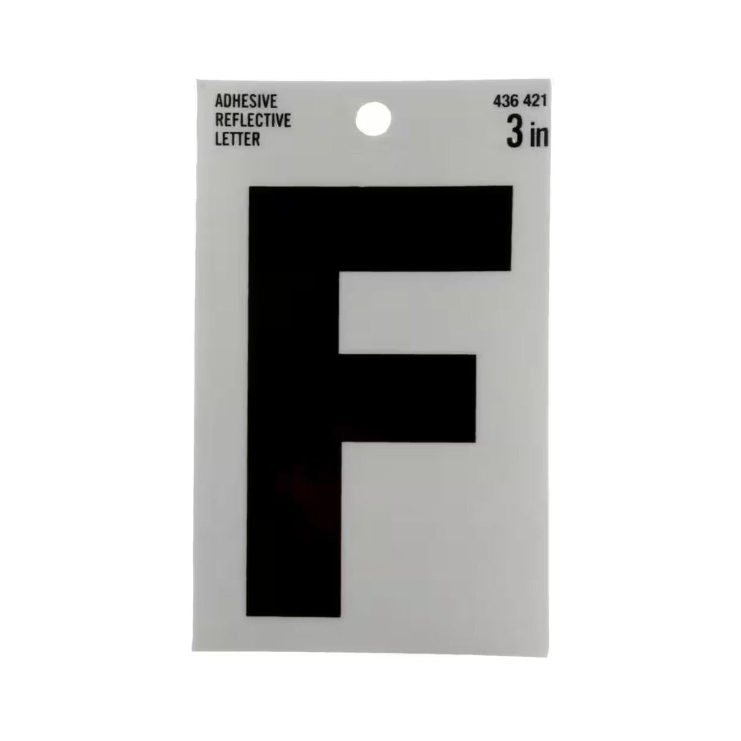 The image features a package of Simpson Strong-Ties EVERBILT 3 in. Vinyl Reflective Letter F, designed for improved visibility and safety. The white packaging has black text and a circular hole at the top for easy hanging.