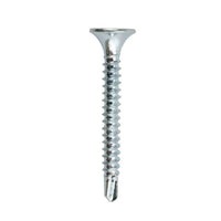 A GRIP-RITE 114ZSDS1 #6 x 1-1/4 in. zinc-plated self-drill drywall screw by Grip-Rite, featuring a bugle head and fine thread, compliant with ASTM C1002 standards, isolated on a white background.