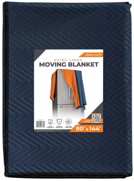A folded dark blue moving blanket with a zigzag stitch pattern offers excellent damage protection. The label shows a fridge partially covered by an orange and blue blanket and reads PRATT RETAIL SPECIALTIES 80 in. L x 144 in. W Extra-Large Premium Moving Blanket, perfect for floor protection during transit.