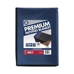 A folded, blue Go Build Premium Moving Blanket (80 in. L x 72 in. W) is shown with a label featuring images and text in various colors, highlighting its use for furniture padding and floor protection. Brand: The Fastest Way To Build.