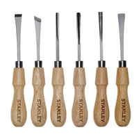 The STANLEY 6 PC WOOD CARVING TOOL SET features six wood-handled chisels and gouges with unique steel blades, arranged upright on a white background—perfect for detailed woodworking projects.
