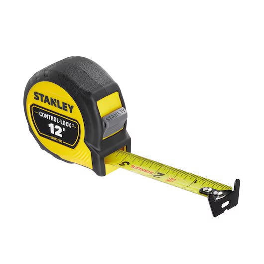 A yellow and black 12 ft. CONTROL-LOCK™ Tape Measure by STANLEY is shown partially extended, displaying measurement markings. The durable tool features the STANLEY and CONTROL-LOCK™ names on its case.