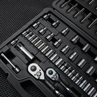A close-up of the STANLEY 85PC SKT SET: a black plastic case with organized chrome vanadium steel socket wrenches, ratchets, and assorted sockets and bits, displayed on a textured dark surface.