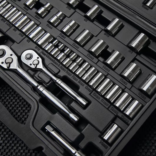 A close-up of the STANLEY 85PC SKT SET in a black case, featuring various socket sizes and chrome ratchet handles made from durable chrome vanadium steel, all neatly arranged in labeled slots.
