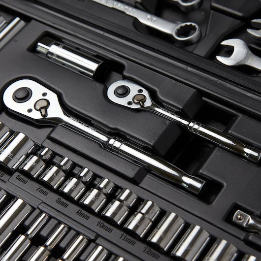A close-up of the STANLEY 1/4 IN & 3/8 IN DRIVE MECHANIC TOOL SET (145 PC) shows ratchets, sockets, and wrenches neatly organized in a black case with millimeter size labels—an essential for any automotive toolkit.