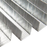 Close-up of several rows of STANLEY® Heavy-duty Staples, 12mm (1,000 PACK), arranged in parallel to display their shiny silver finish and U-shaped design, commonly used as construction fasteners.