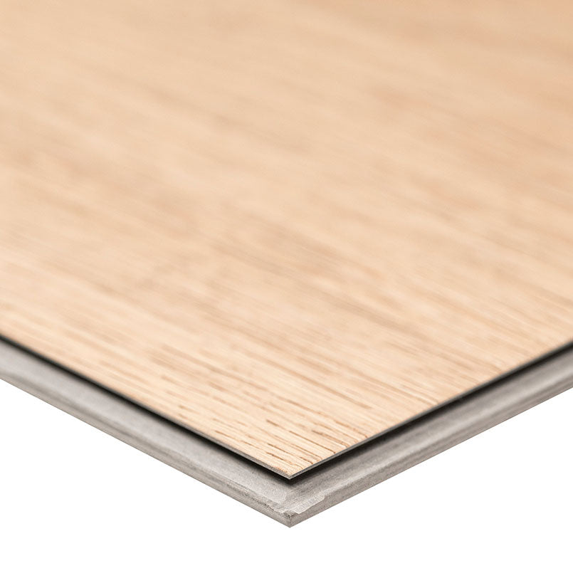 Close-up of the edge of MSI Cyrus Chester Hills Luxury Vinyl Planks BOX (23.77 SQFT), showing its realistic wood grain surface, sturdy backing layer, and durable CrystaLux™ protection.