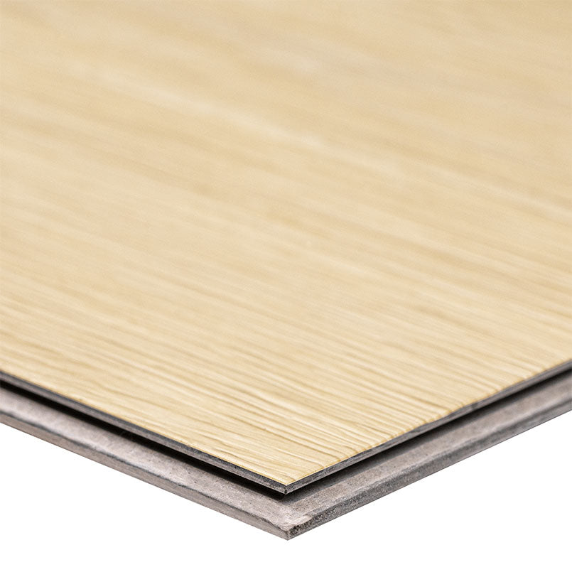 Close-up of overlapping Cyrus Lenexa Creek Luxury Vinyl Planks by MSI, featuring a light woodgrain top and gray base, showcasing waterproof flooring thats easy to install for DIY projects.