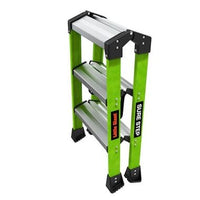The LITTLE GIANT 11953 Sure Step 1AA is a green, double-sided fiberglass step stool with three silver steps and black non-slip feet, labeled "Sure Step" on one side.