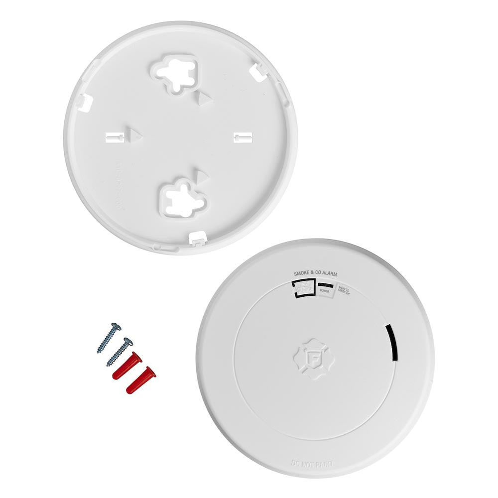 FIRST ALERT 1046796 SMCO210 10-Year Battery Combo Smoke and CO Alarm with slim profile, separate mounting plate, three screws, and three wall anchors are shown on a plain white background.