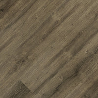 Close-up of MSI Cyrus Walnut Waves Luxury Vinyl Planks (23.77 sq ft box) featuring realistic grain, staggered layout, and CrystaLux protection for lasting durability.