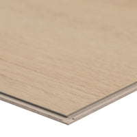 A close-up of an XL Cyrus Chester Hills Luxury Vinyl Plank from MSI, showing its tongue-and-groove edge and CrystaLux™ protective layer, displayed on a plain white background.