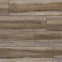 Close-up of MSIs XL Cyrus Exotika Luxury Vinyl Planks (22.44 SQFT/box) in brown and gray wood-look, arranged in a staggered pattern with realistic grain, offering enhanced durability and waterproof performance.