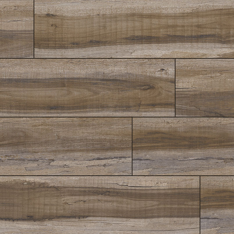 Close-up of MSIs XL Cyrus Exotika Luxury Vinyl Planks (22.44 SQFT/box) in brown and gray wood-look, arranged in a staggered pattern with realistic grain, offering enhanced durability and waterproof performance.