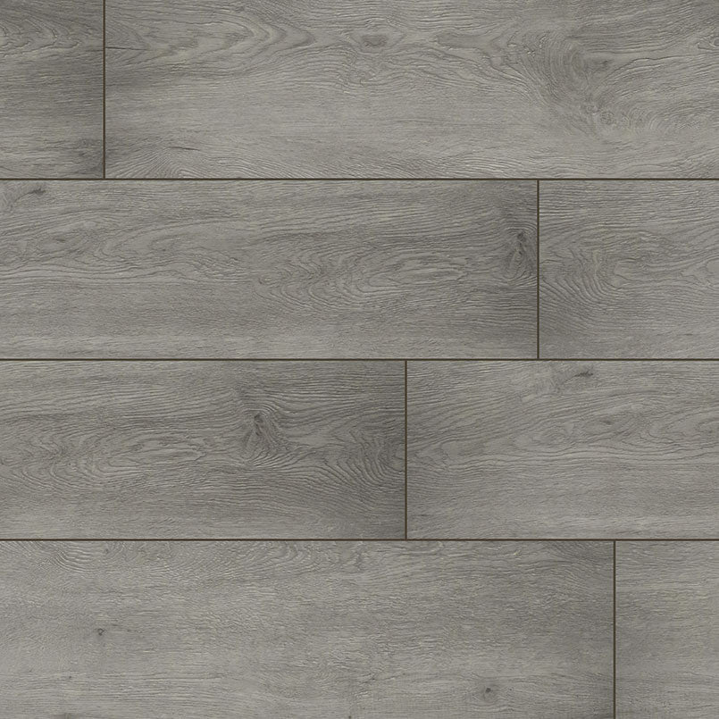 MSI XL Cyrus Grayton Luxury Vinyl Planks feature gray, wood-style design with a natural grain, smooth matte finish, waterproof construction, and an easy click-lock system for a modern look. Each box covers 22.44 sq ft and installs in a staggered pattern.