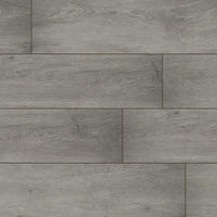 MSI XL Cyrus Grayton Luxury Vinyl Planks feature gray, wood-style design with a natural grain, smooth matte finish, waterproof construction, and an easy click-lock system for a modern look. Each box covers 22.44 sq ft and installs in a staggered pattern.