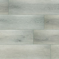MSI XL Cyrus Kardigan Luxury Vinyl Planks feature light gray tones, natural wood grain, and knots. The waterproof, rigid core construction ensures durability and style—each box covers 22.44 SQFT for a modern look in any space.
